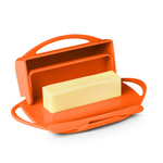 Load image into Gallery viewer, Picture depicts a orange butter dish with two side handles, the lid up, and a matching knife. 

