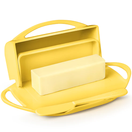 Picture depicts a yellow butter dish with two side handles, the lid up, and a matching knife. 