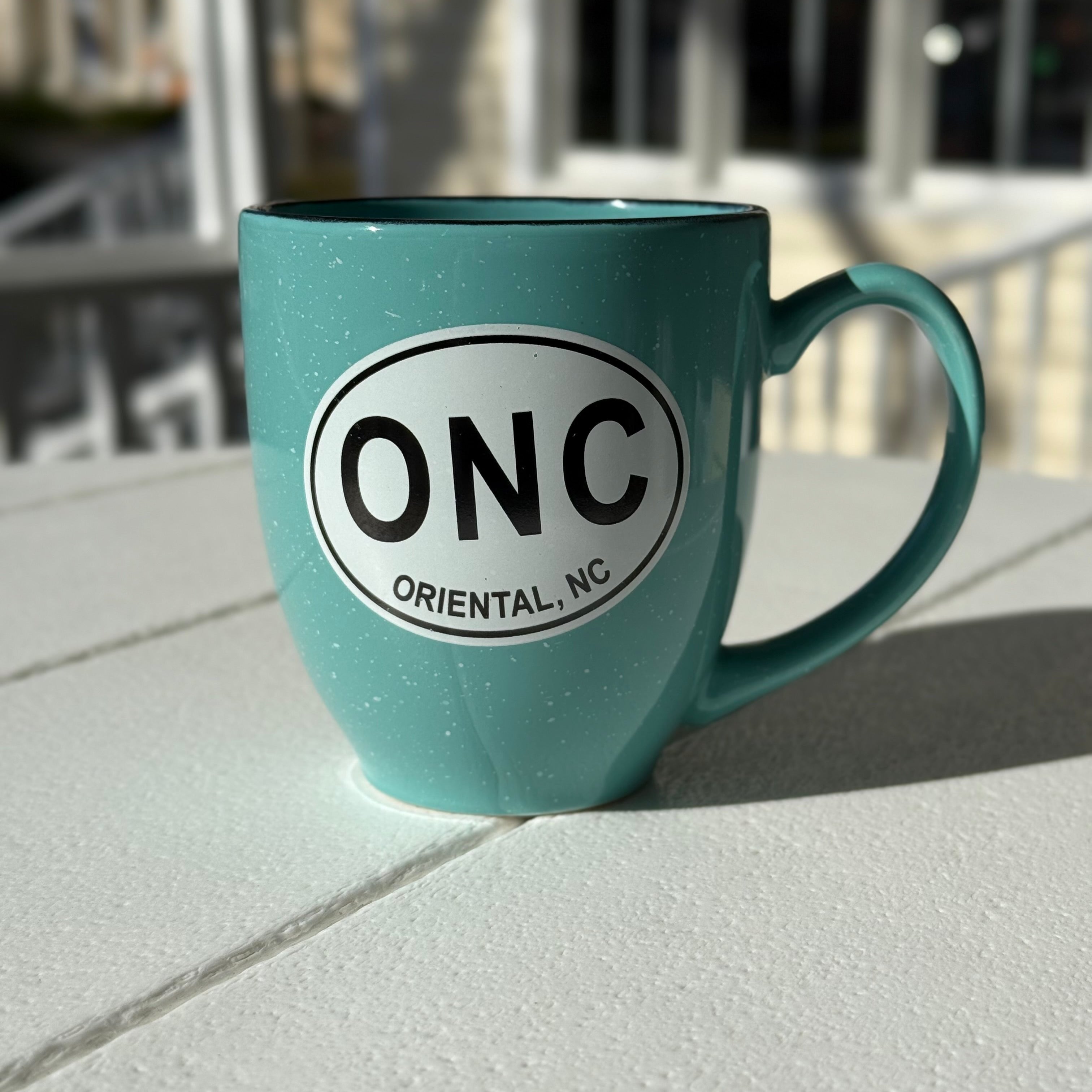 Aqua colored Bistro Mug with Oriental North Carolina Decal.