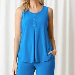 This ocean blue top is sleeveless with buttons 1/4 down the front and a lovely pleat!