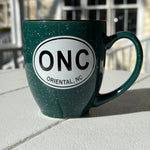 Load image into Gallery viewer, green colored Bistro mug with Oriental North Carolina decal on it. 
