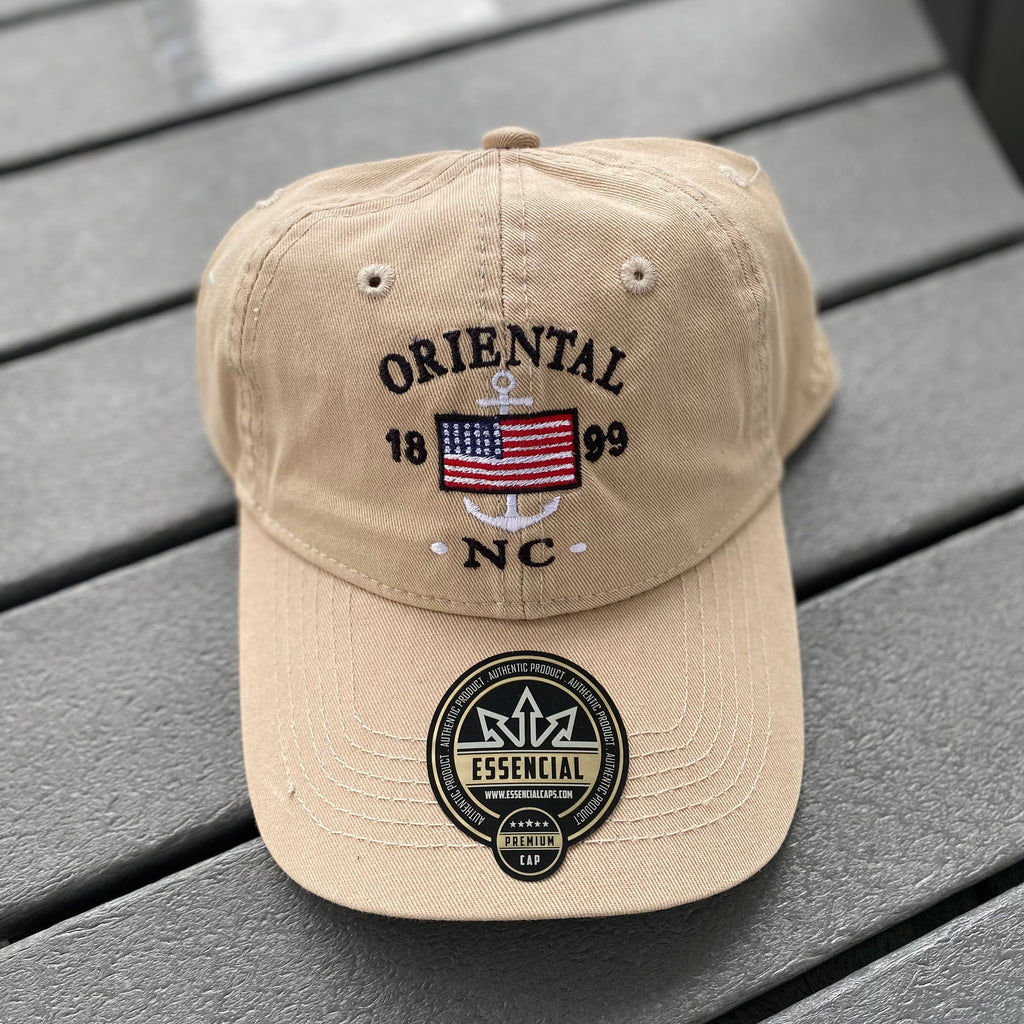 Tan Colored Hat with American flag and Oriental on it.