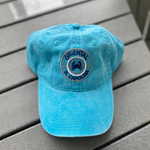 Aqua colored hat with crab and Oriental, N. Carolina