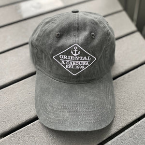  Dark grey hat with an anchor on it 