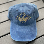 Load image into Gallery viewer, Navy colored hat with anchor on it 
