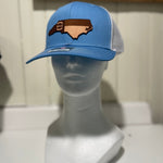 Load image into Gallery viewer, Blue and white hat with a North Carolina shape emblem with the NC flag on it
