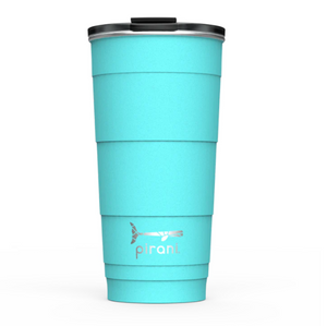 Picture depicts an aqua tumbler with different size measuring ridges and a black lid. Pirani logo is a small segmented whale.