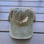 Load image into Gallery viewer, Olive green ball cap with grey shark embroidered on it.
