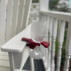 Red Wine grasp secured with clear wine glass