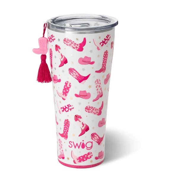 Shimmery white tumbler with pink cowgirl boots and hats. Also has a pink cowgirl boot tassle. 